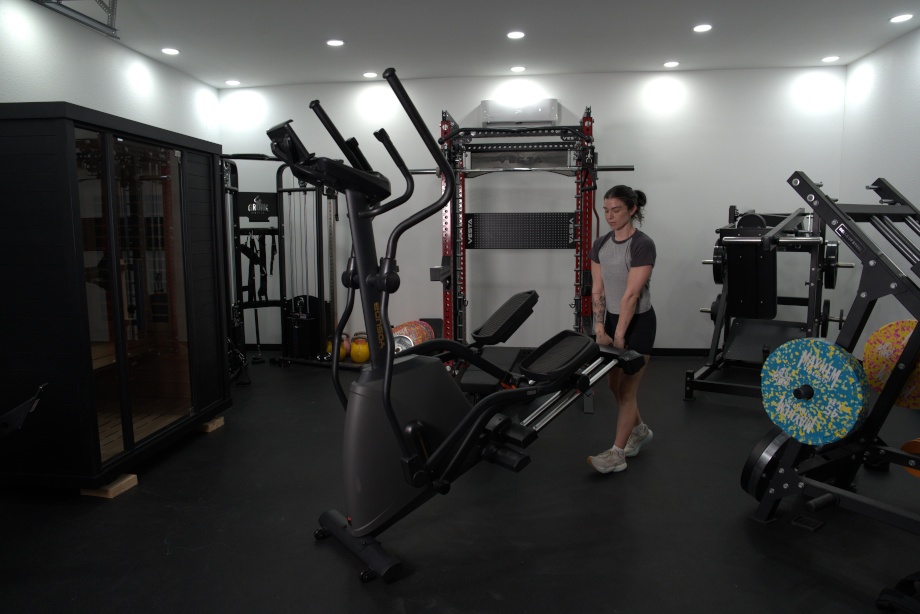 Our tester moving a Yosuda Dolphin Elliptical