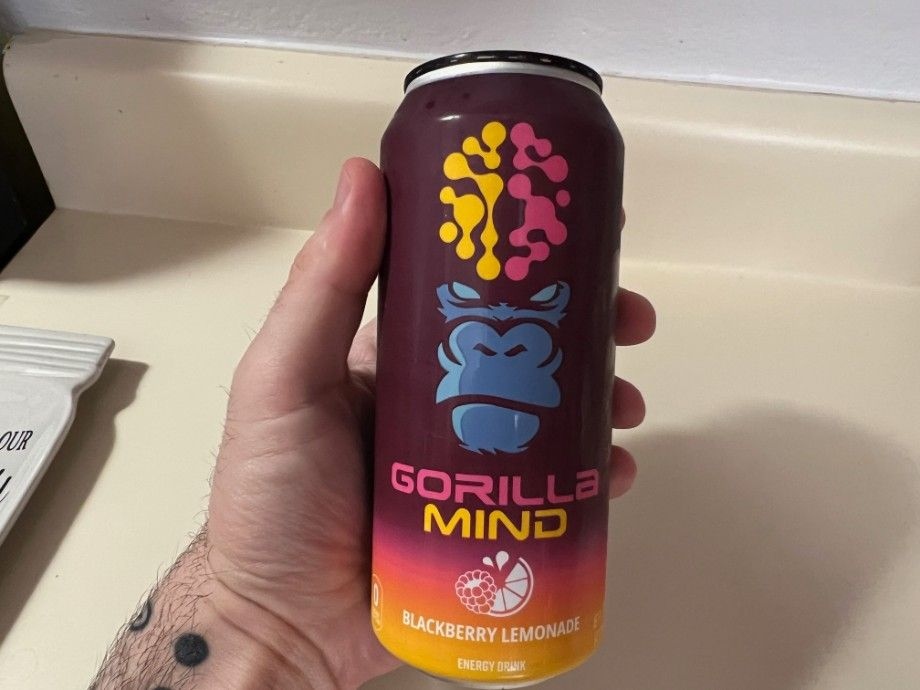 Our tester holding Gorilla Mind Energy Drink