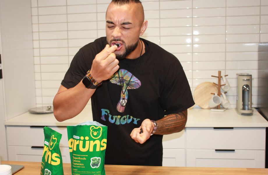 Man eating Grüns gummies