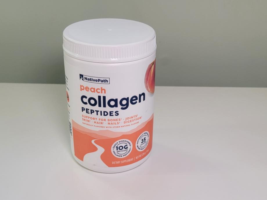 A closed container of NativePath Collagen Peptides sits on a white table