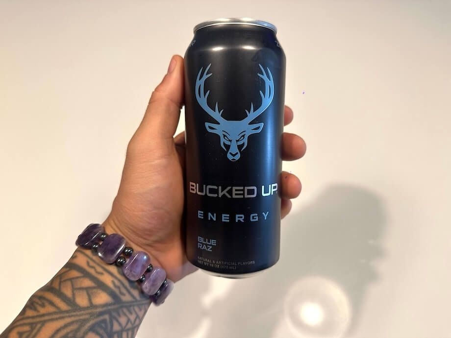 Our tester holds a can of Bucked Up Energy.