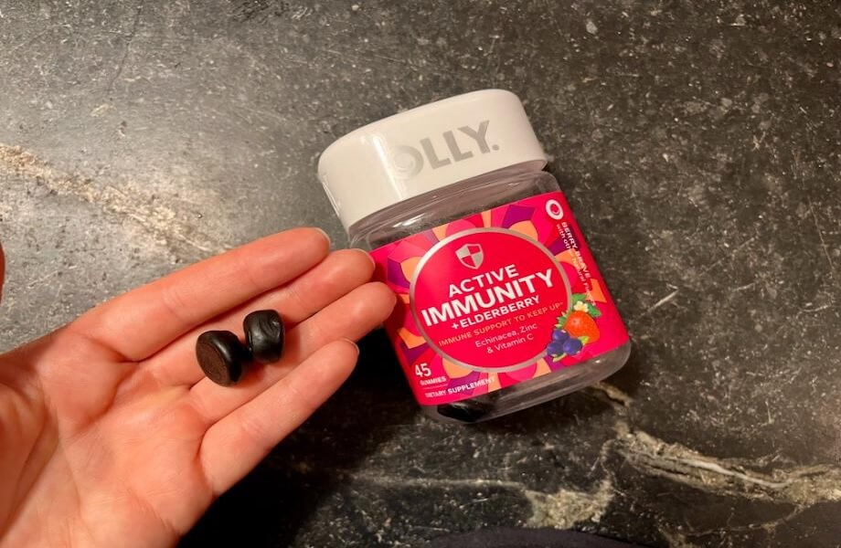 Our tester holding multiple Olly Active Immunity gummies