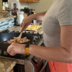 Our tester preparing a meal from Blue Apron