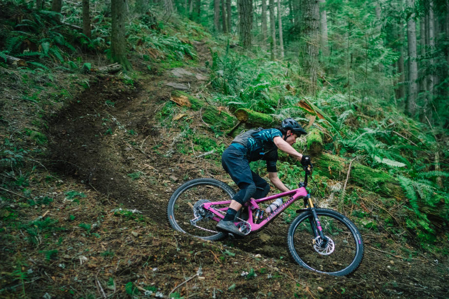 Luke Burgess downhills on a windy path with a Transition Smuggler