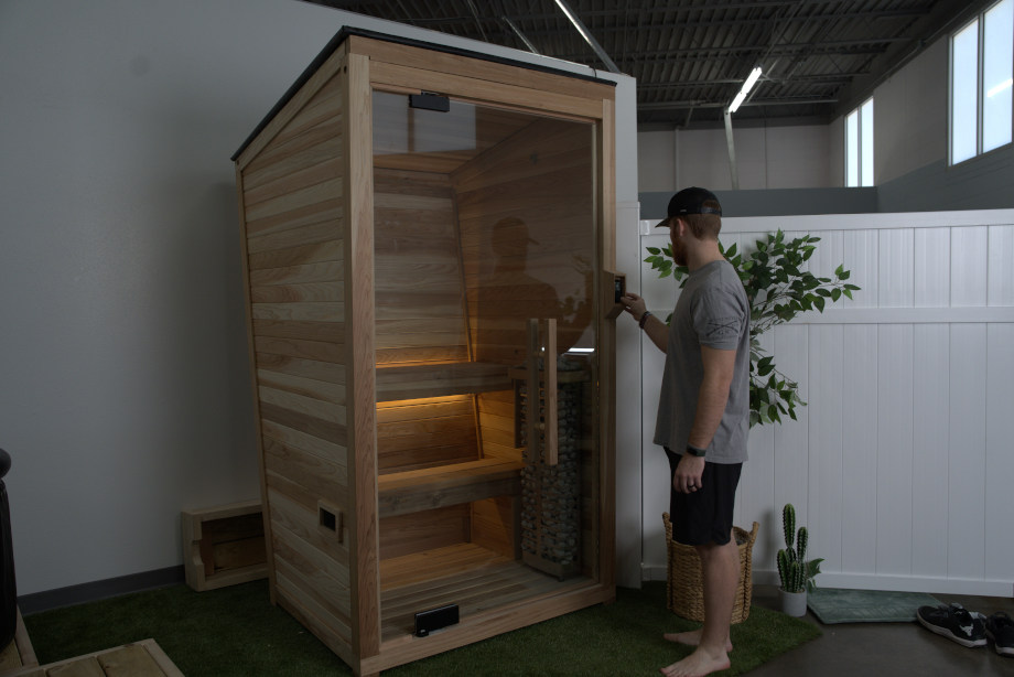 Our tester Tristan entering a Plunge The Sauna Mini