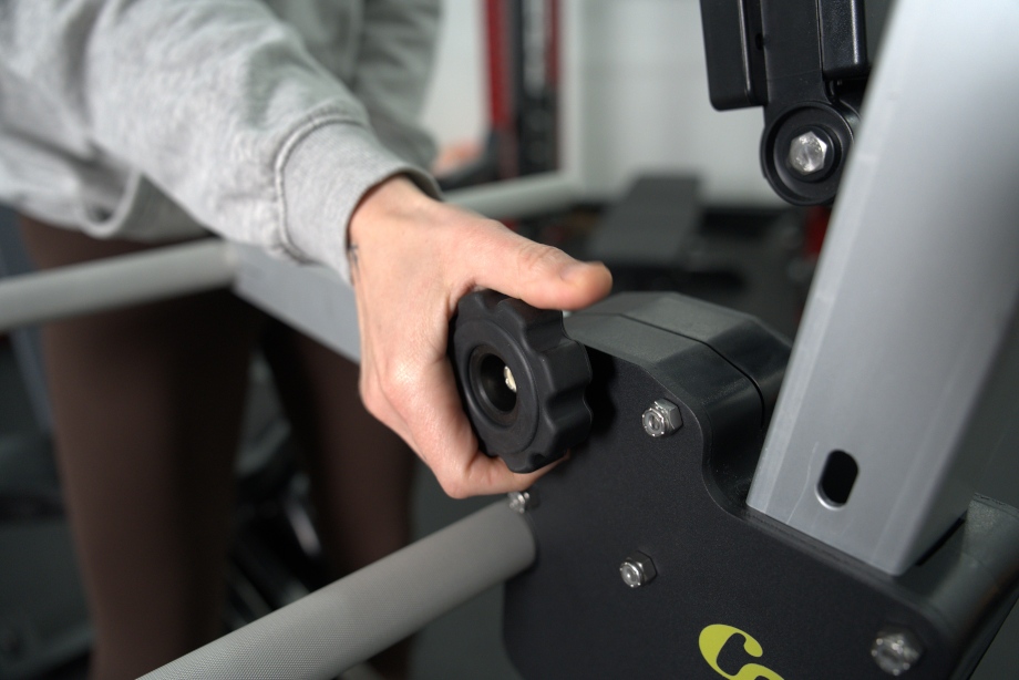 Our tester turns a knob on the Concept 2 Strength ERG