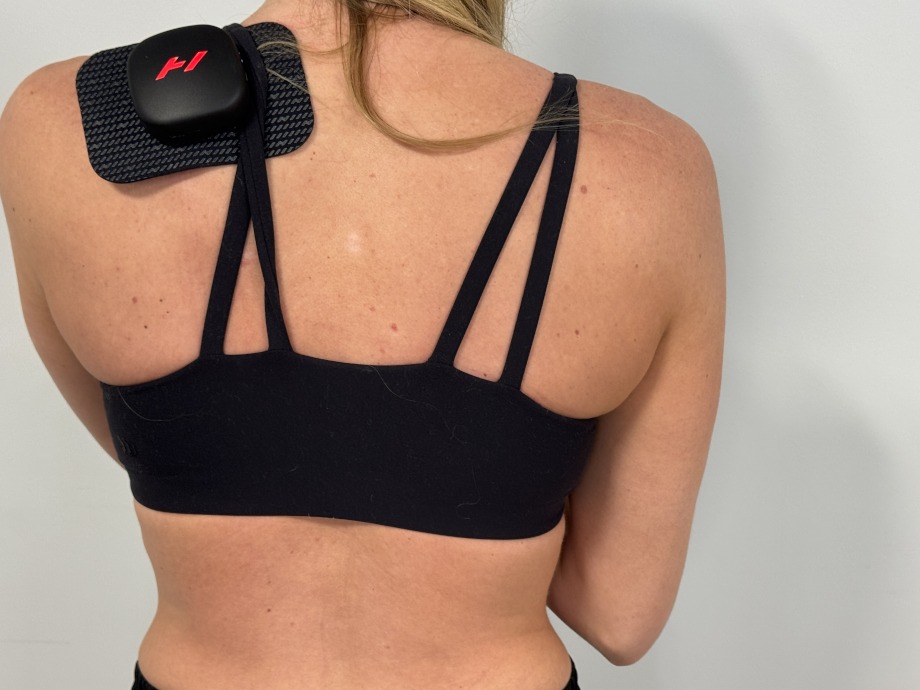 A person using a Hyperice Venom Go