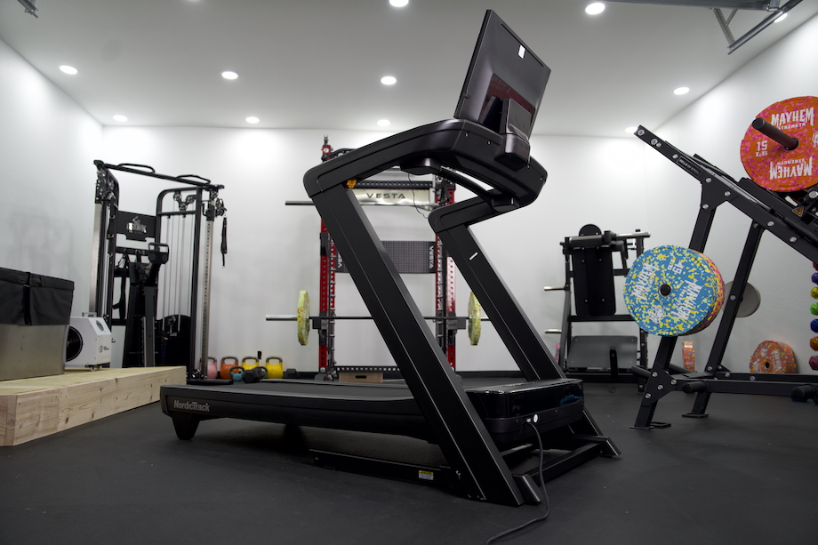 Full view of the NordicTrack Commercial 2450 treadmill in a studio gym