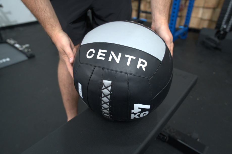 Our tester holding a Centr x HYROX Competition Wall Ball