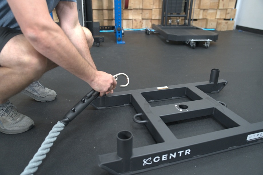 Our tester hooks up a rope to a Centr x HYROX Competition Power Sled