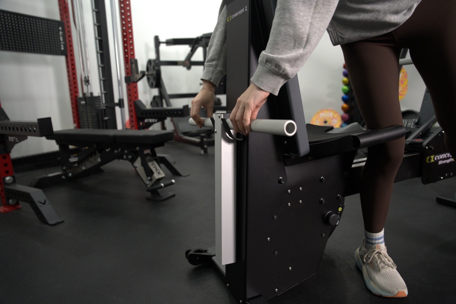 Our tester lifts the handle from its cradle on the Concept 2 Strength ERG