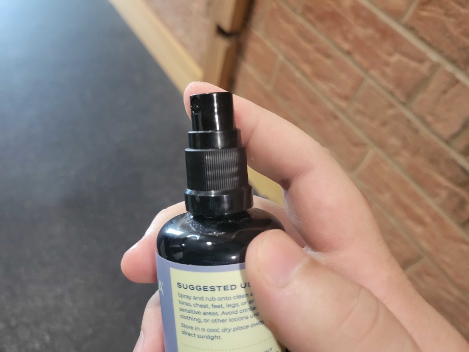 Spray tip on a bottle of Cymbiotika Topical Magnesium Oil
