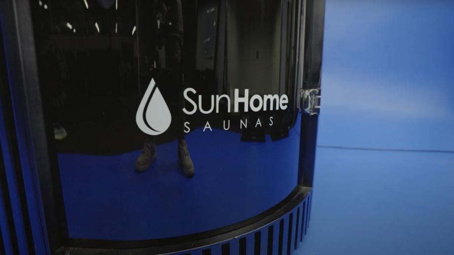 The logo on a Sun Home Pod Sauna
