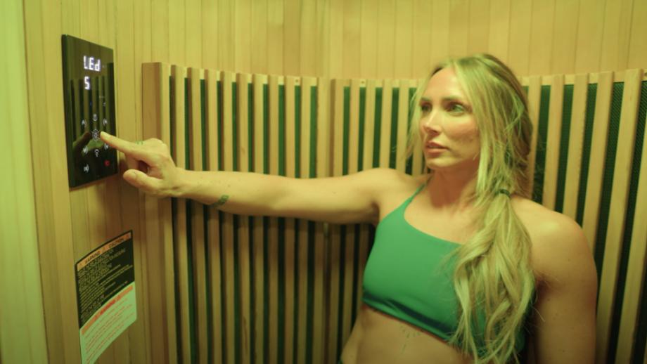 Our tester configures a Sun Home Pod Sauna