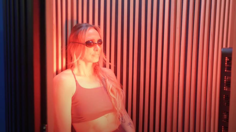 Our tester using a Sun Home Pod Sauna