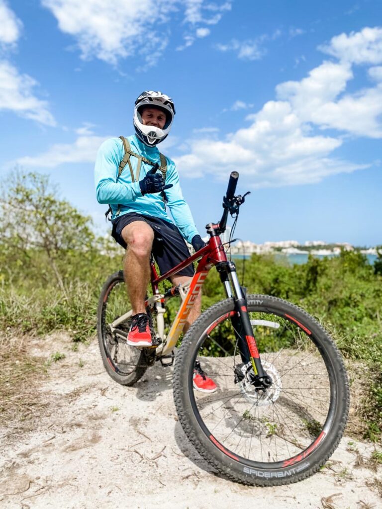 A mountain bike rider wearing an O'Neal Sonus Mountain Bike Helmet