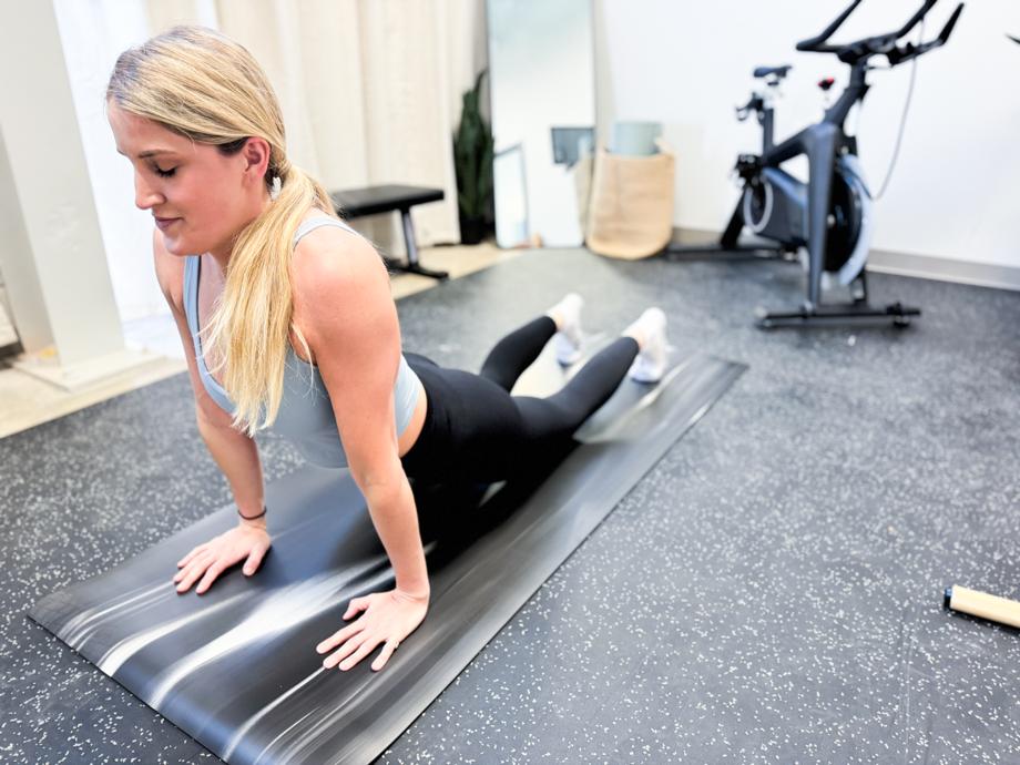 Our tester using a lululemon The Mat