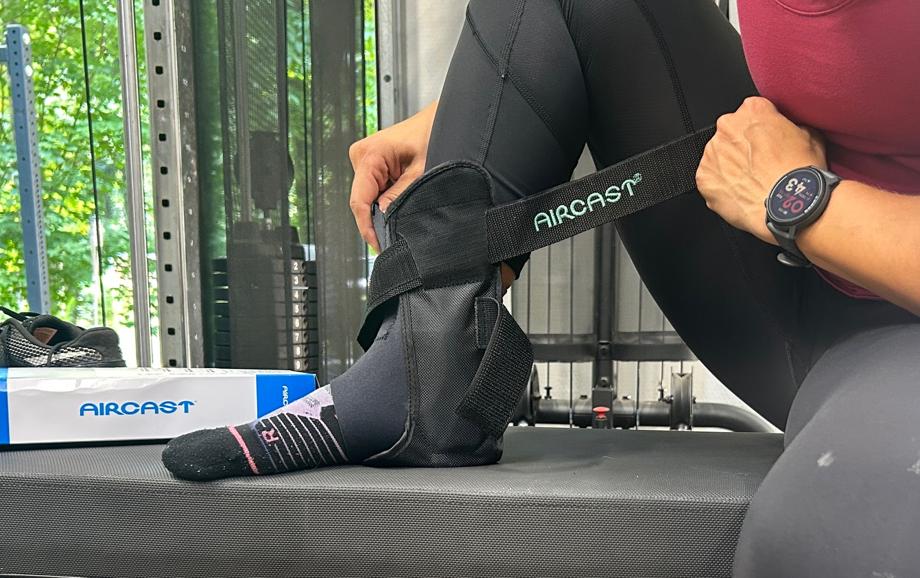 Our tester putting on Aircast Ankle Support Brace