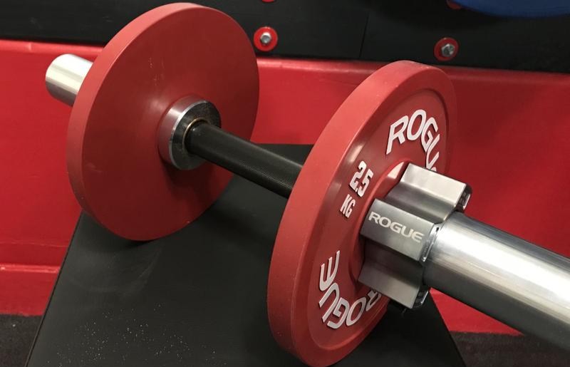 Rogue Loadable Dumbbells on box