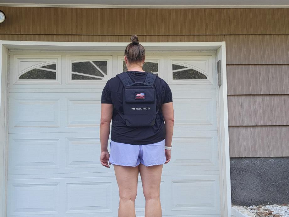 A woman wearing the GORUCK Ruck Plate Carrier 3.0