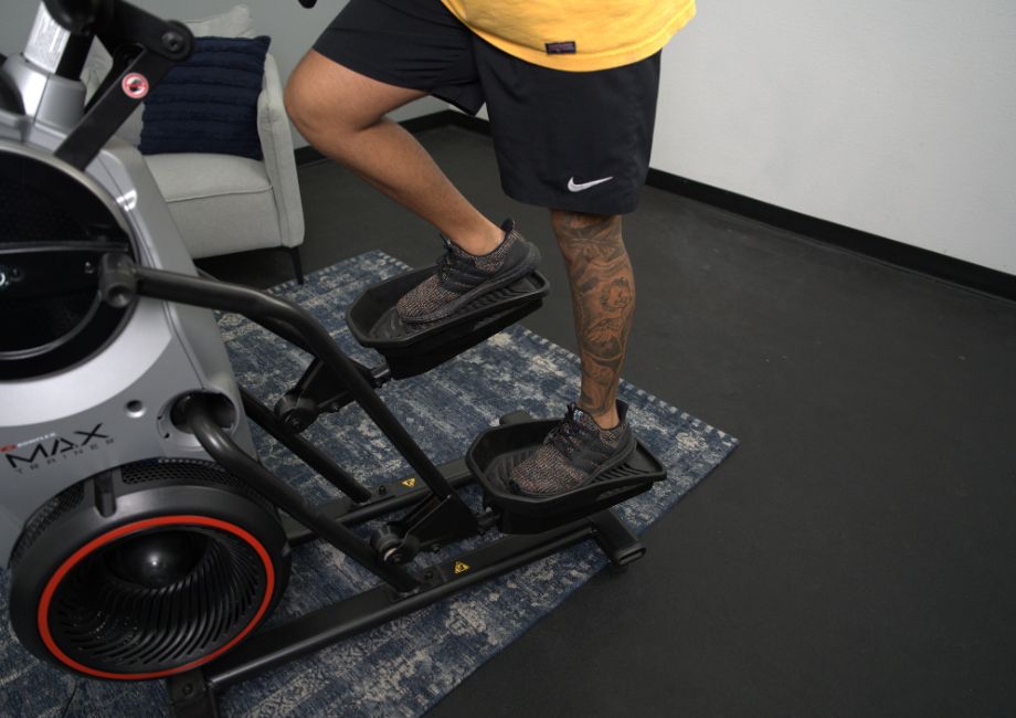 A close-up view of the pedals on the Boxflex Max Trainer M6