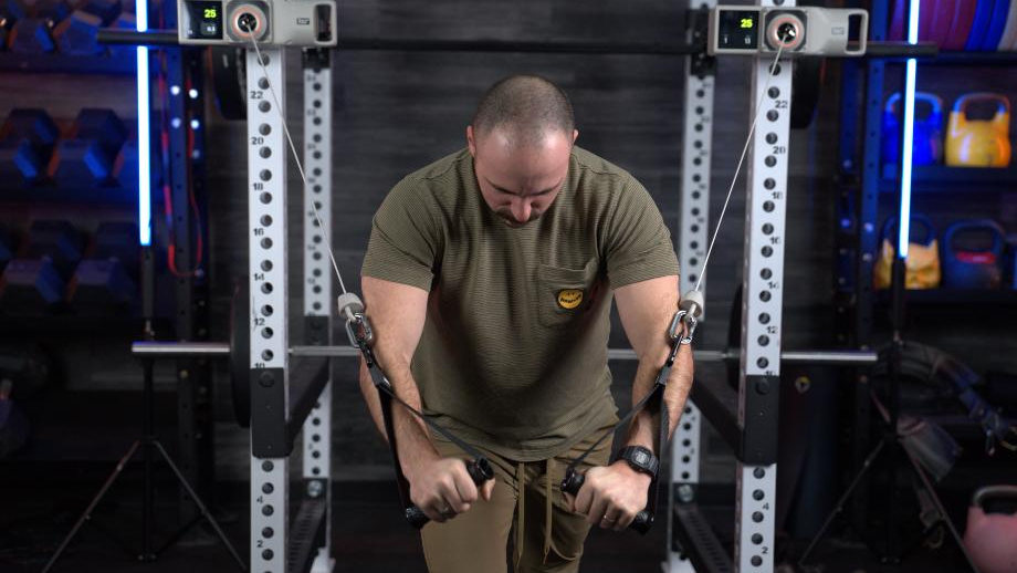 Coop working out with Beyond Voltra