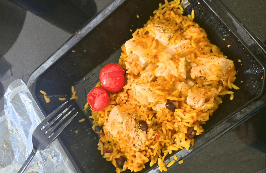 Our tester enjoying a chicken and rice bowl from Forkful meal delivery services