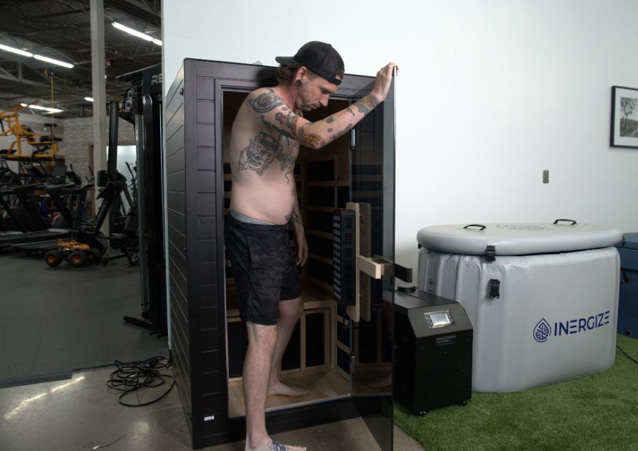 A man stepping inside the SaunaBox Solara