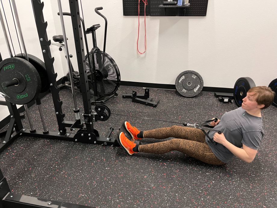 Product tester looking at the console on the Horizon 7.0 AT treadmill