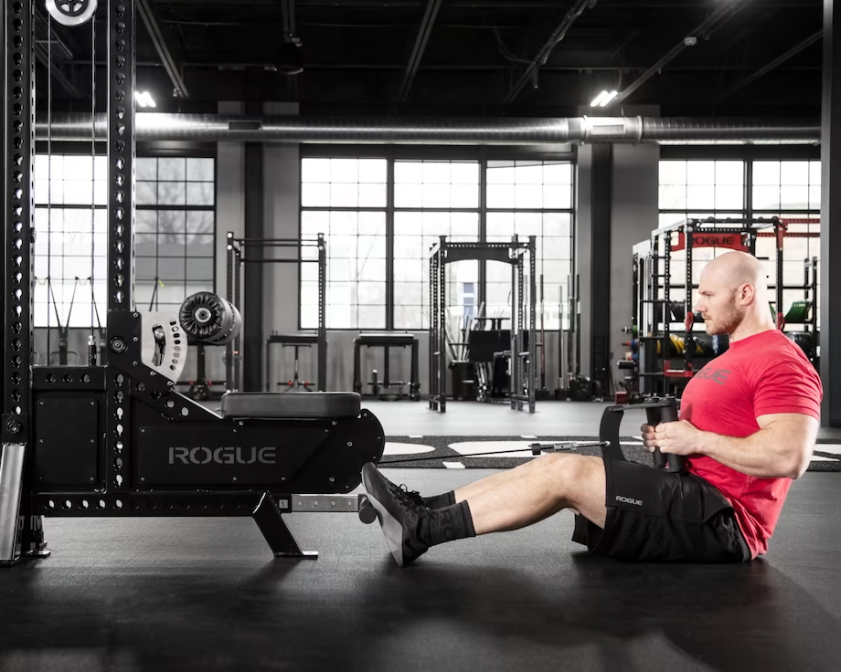 Man performs low rows on the Rogue LP-2 lat pulldown machine