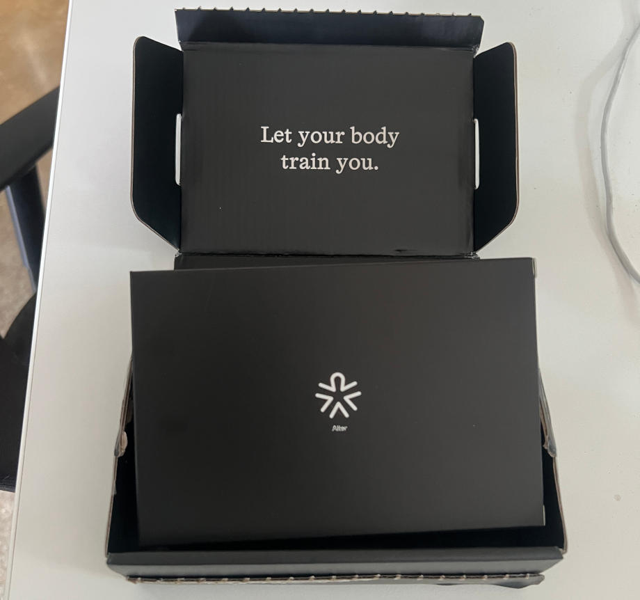 An opened box showcasing the Alter DNA Test kit