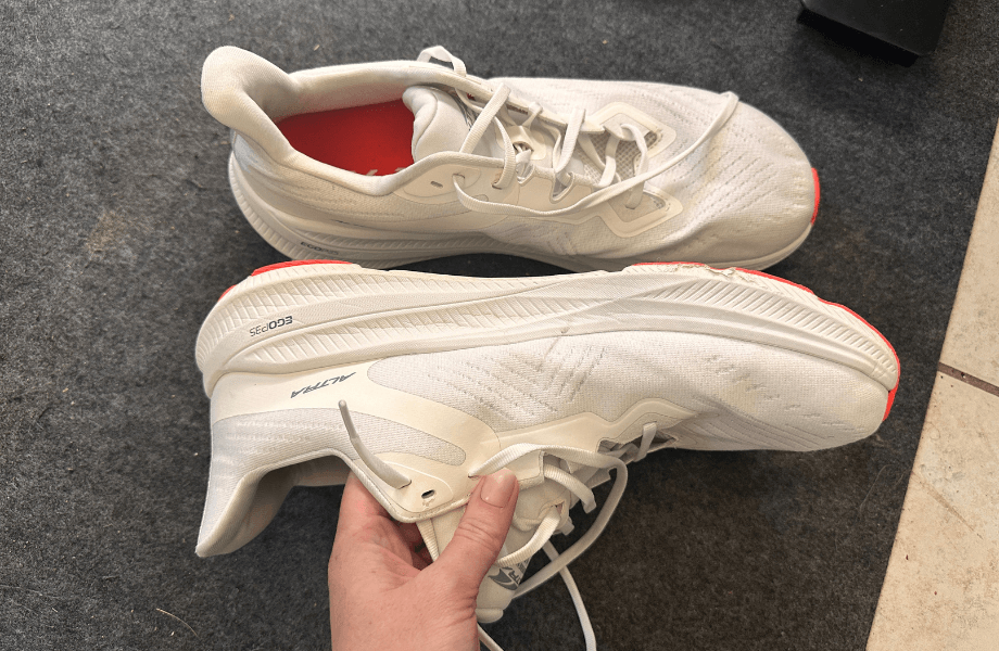 Our tester showcasing the upper of the Altra Experience Flow 2 running shoes