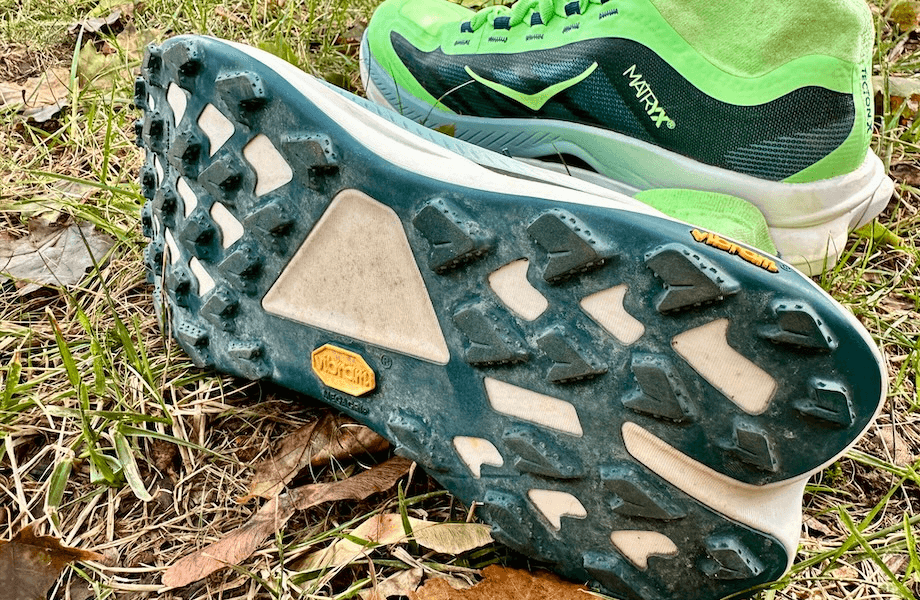 The Vibram Megagrip outsole featured on the HOKA Tecton X 3 trail running shoes
