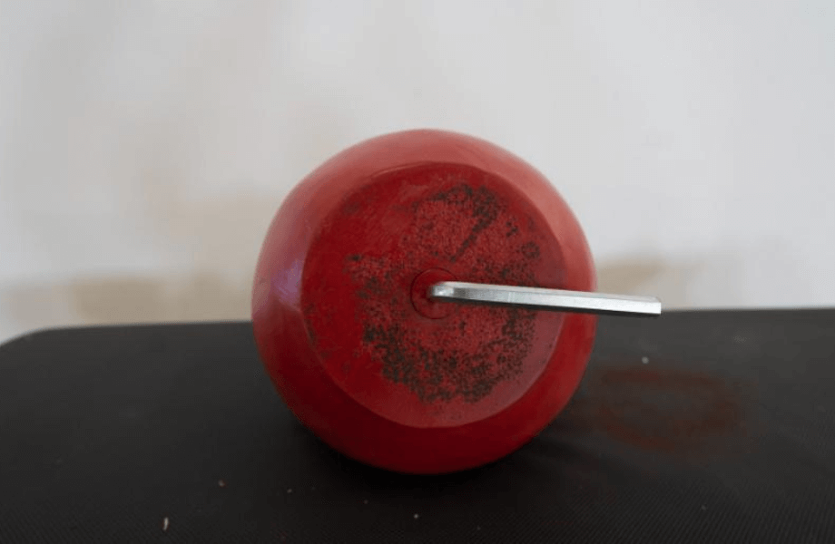 The Allen key locking mechanism featured on the base of the Titan Fitness Adjustable Competition-Style Kettlebell