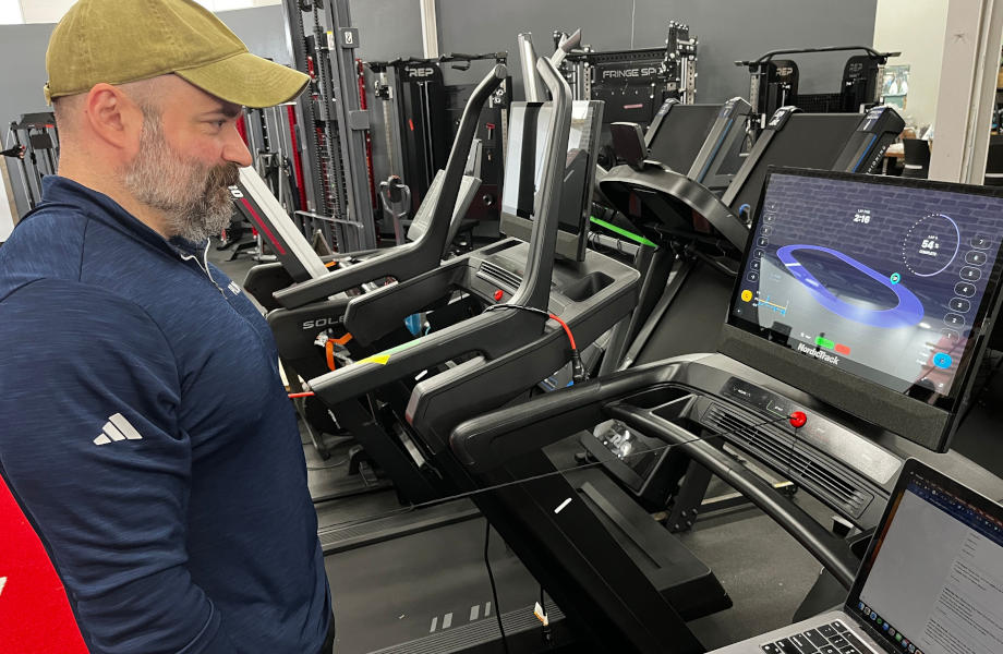 Our tester walking on a NordicTrack treadmill for testing in our equipment facility.