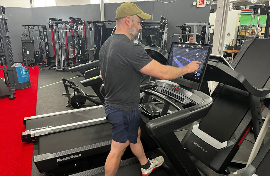 Our tester walking on a NordicTrack treadmill for testing in our equipment facility.