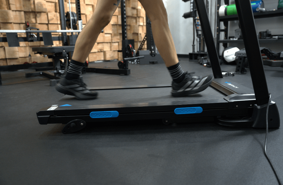 Our tester walking on the MERACH T12 Foldable Walking Treadmill