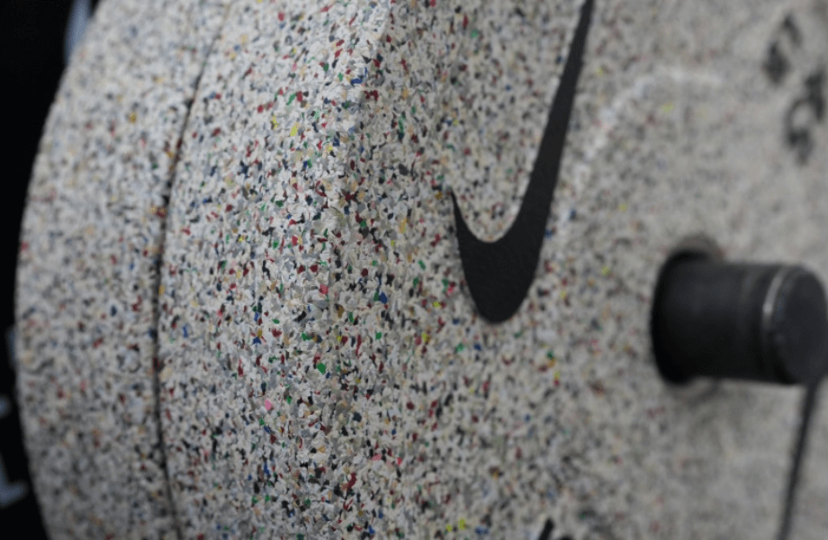 A closeup view of the Nike Grind Bumper Plate's speckled aesthetic