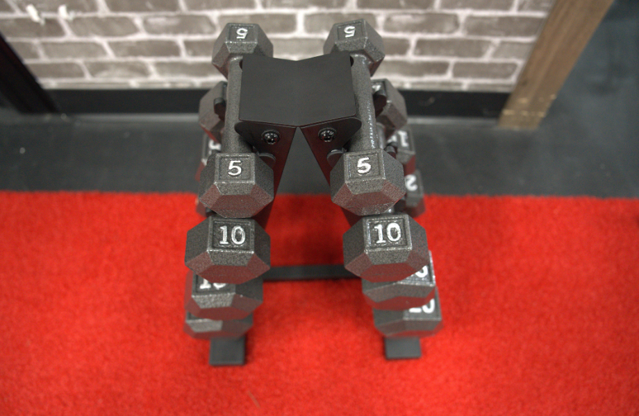 CAP Cast Iron Hex Dumbbells on a weight tree