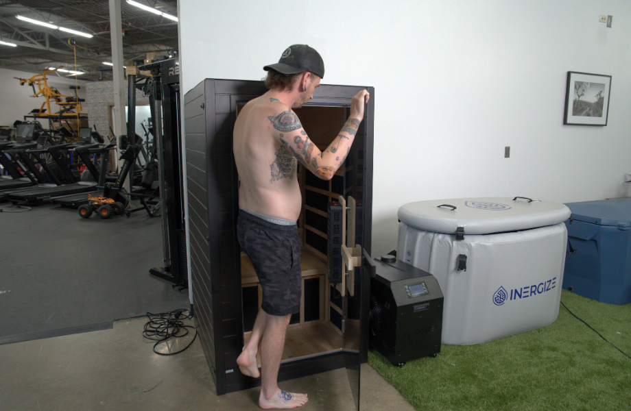 Our tester stepping into the SaunaBox Solara infrared sauna