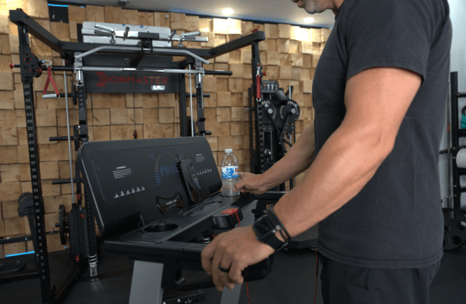 Our tester pausing after a workout on the Wellfit TM024 Treadmill