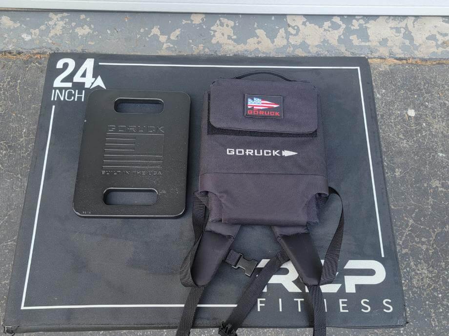 GORUCK Plate Carrier 3.0 and weight plate on plyo box