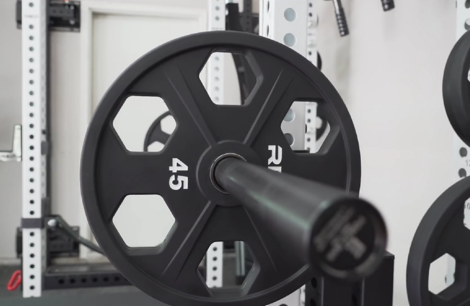 REP Fitness Equalizer Urethane-Coated Plates loaded onto a barbell