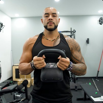 Stephen Sheehan holding a kettlebell