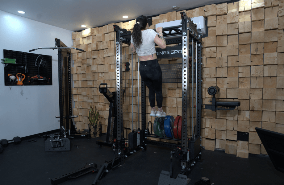 Our tester performing a pull-up inside the Fringe Sport Dane 2.0 functional trainer