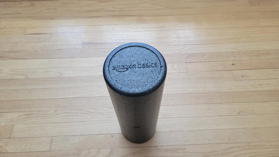 Logo on the end of an Amazon Basics High Density Foam Roller