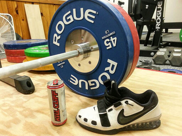 Mat Fraser's Home Gym rogue calibrated bumper plates