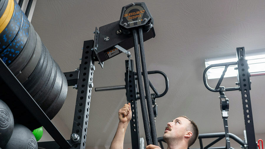 coop setting up the Torque Endless Rope Trainer