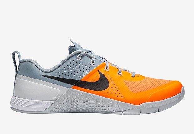 orange and grey Nike Metcon 1