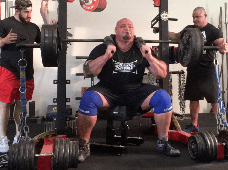 Brian Shaw performing a squat in his Garage Gym